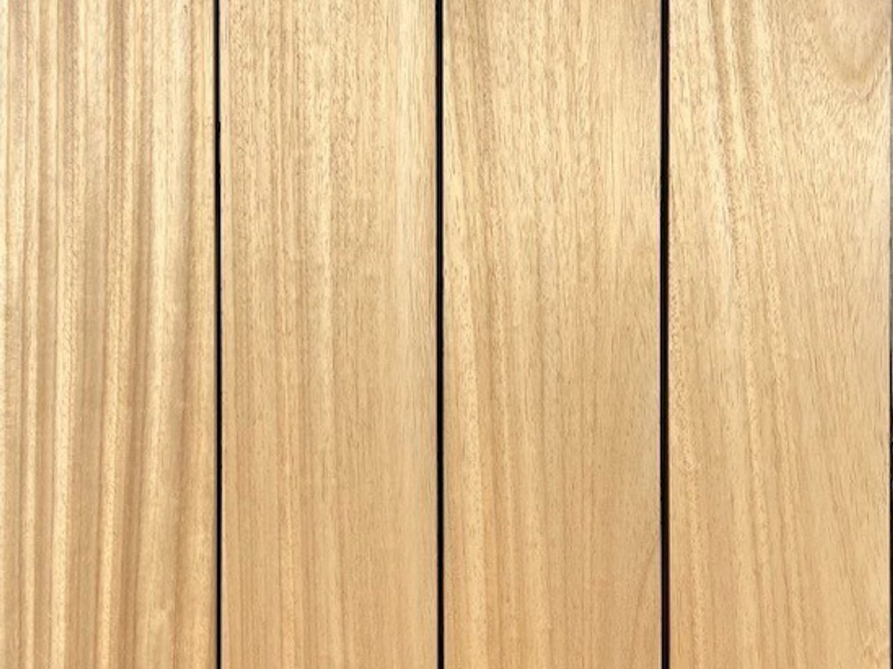 Close-up of vertical light-brown wooden planks with visible grain and small screws along the edges.