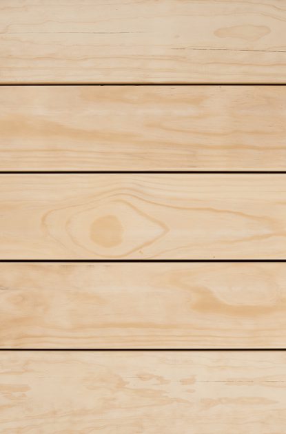 Light wooden planks arranged horizontally with visible grain and narrow gaps, warm beige tone and smooth surface.