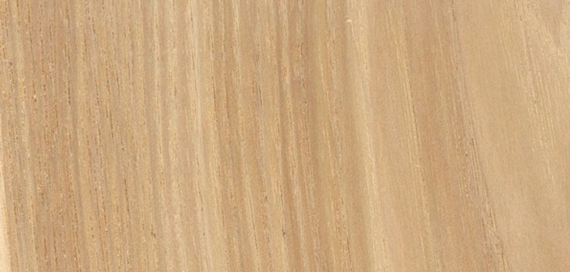 Close-up of light beige wood with subtle vertical grain patterns.