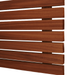 Close-up of brown wooden horizontal slats forming a wooden blind with evenly spaced gaps against a white background.