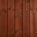 Vertical reddish-brown wooden planks with visible grain lines and knots.