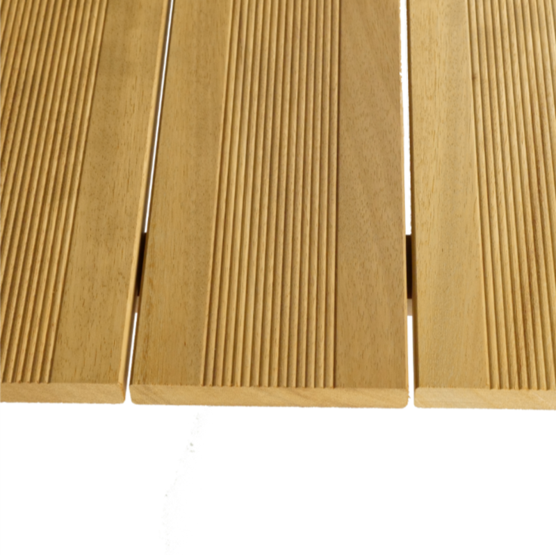 Close-up of light brown wooden planks with parallel grooves and visible grain, showing narrow gaps between boards.