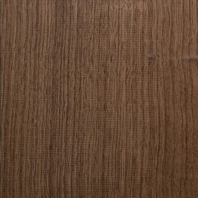 Close-up of a brown wooden surface with visible vertical grain and subtle color variations.