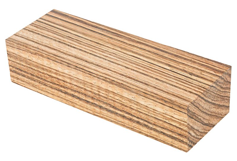 Long wooden beam showing pronounced grain patterns and warm light-brown color, viewed in perspective against a white background.