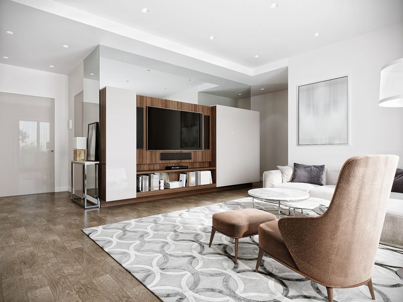 Bright modern living room with white walls, wood floor, wall-mounted TV in a wood media unit, white sofa, brown lounge chair and ottoman, glass coffee table, and abstract art.