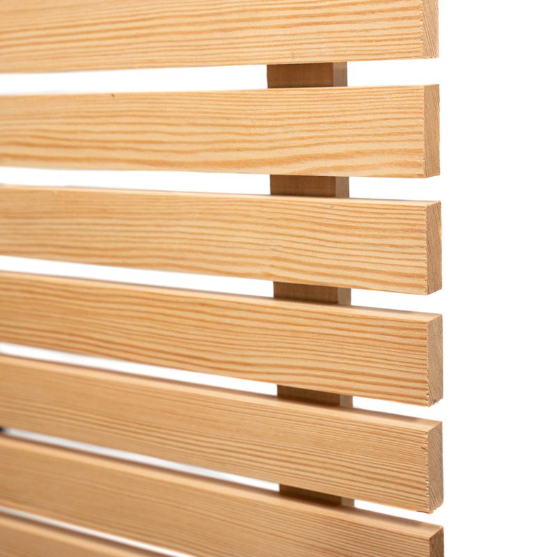 Close-up of light honey-colored wooden slats arranged horizontally with gaps, forming a slatted screen against a white background.
