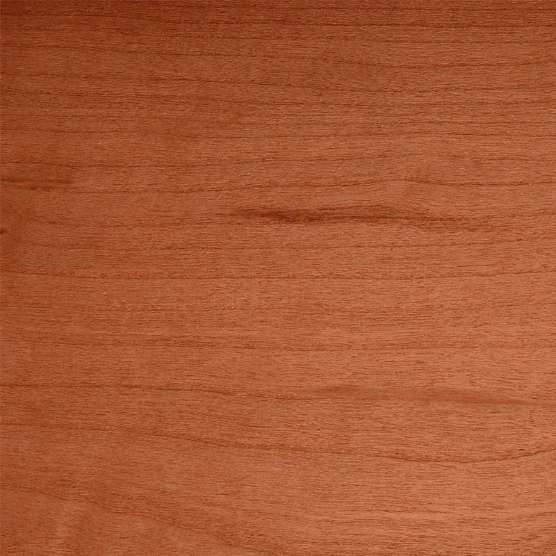 Close-up of a reddish-brown wooden surface with visible grain patterns.