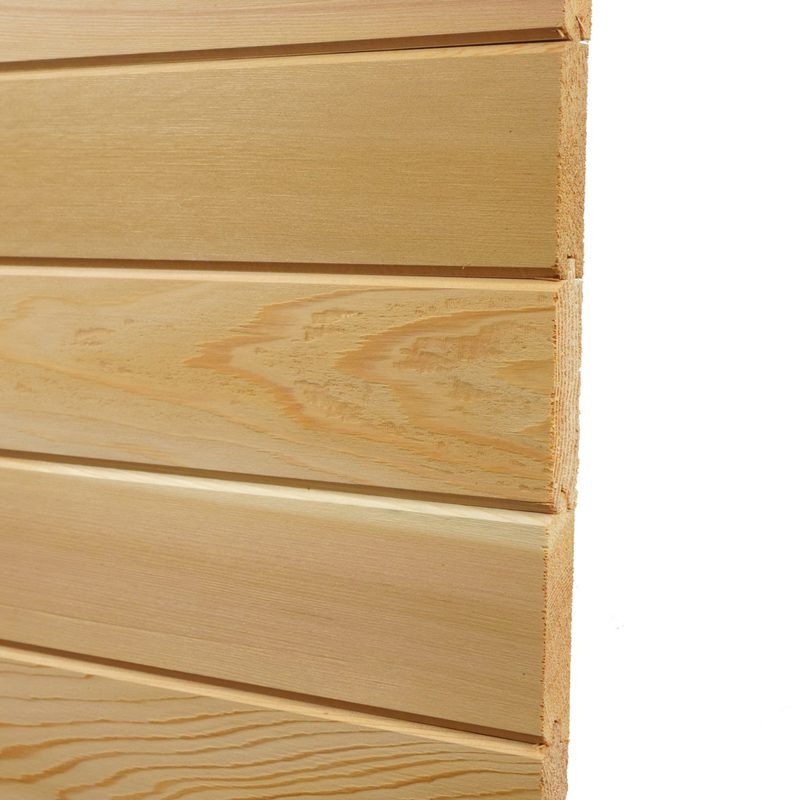 Close-up of light pine wood boards stacked horizontally, showing natural grain and smooth sanded surfaces against a white background.