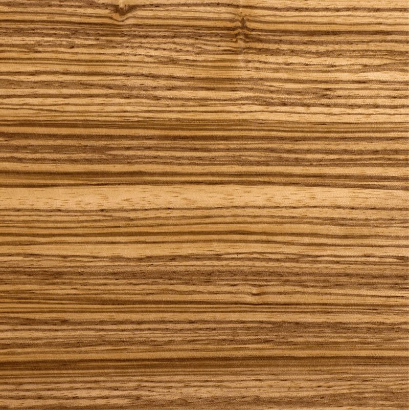 Close-up of a warm brown wood surface with visible horizontal grain lines and subtle darker streaks.