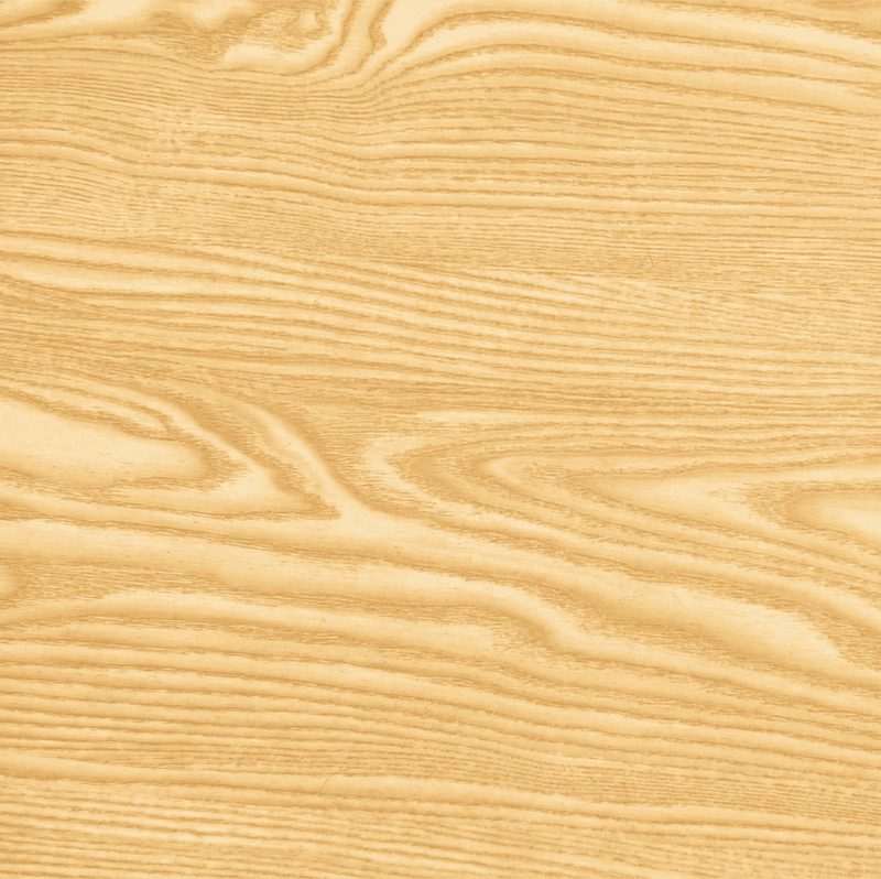 Close-up of a light wood surface with natural grain patterns and soft, wavy lines.