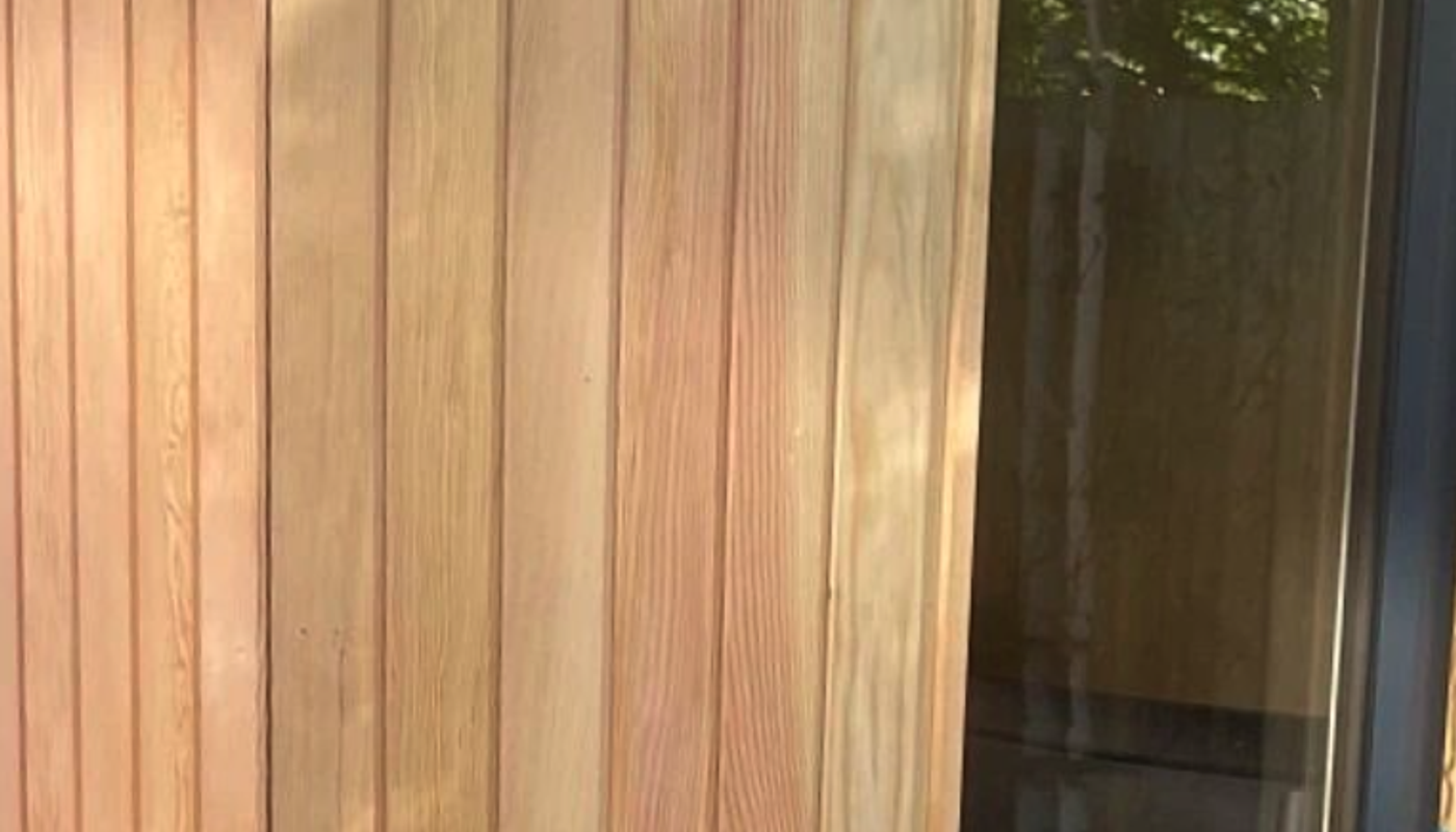 Close-up of douglas fir cladding on a garden room.