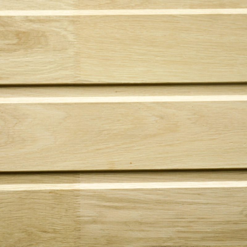Close-up of light oak wooden planks arranged horizontally with narrow gaps and visible wood grain.