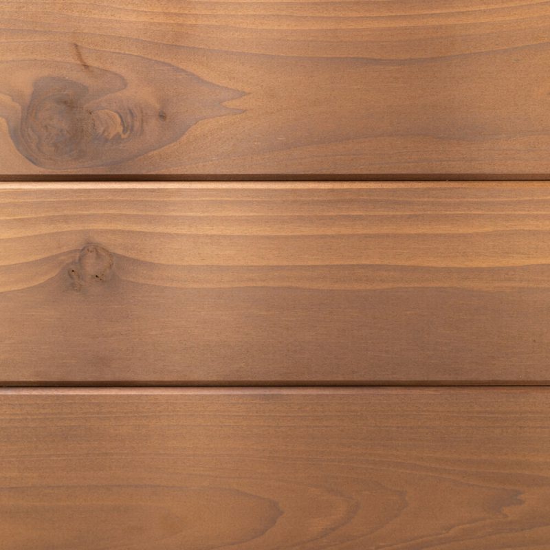 Three warm brown wooden planks with visible grain patterns and knots.