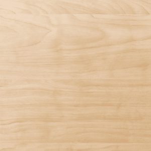 Light wooden surface with subtle grain patterns and warm beige tones.