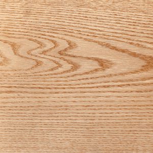 Close-up of light brown wood grain with natural swirls and fine lines.