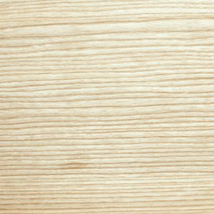 Close-up of a light wood surface with subtle horizontal grain in beige and cream tones.