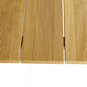Three light-brown wooden planks with parallel grooves on their surfaces, lined up side by side against a white background.