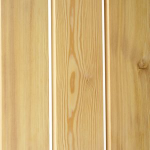 Three vertical wooden planks with light brown grain and a knot on the right plank, separated by slim white gaps.