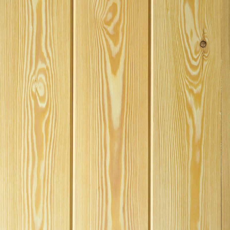 Vertical light wooden planks displaying prominent grain patterns and knots, like a wooden wall.