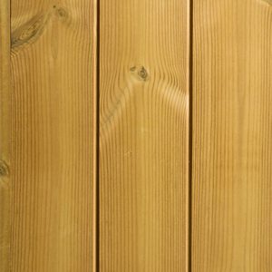 Close-up of vertical wooden planks showing grain, knots, and warm brown tones.