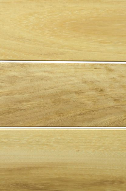 Three horizontal wooden planks with narrow white gaps, showing light to medium brown tones and visible wood grain.