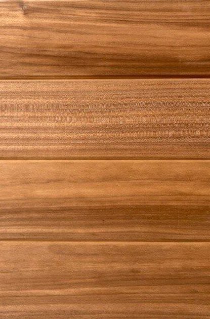 Close-up of warm brown wooden planks arranged horizontally, showing natural grain patterns and seams.